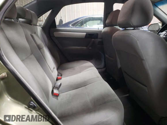 2004 Suzuki Forenza S z VIN KL5JD52Z14K975804, wystawiony jako Copart lot #43227455 z przebiegiem 114 726 mil mil oraz Szkody całkowita. Historia ofert i sprzedaży dostępna na DreamBid. Obrazek 10.