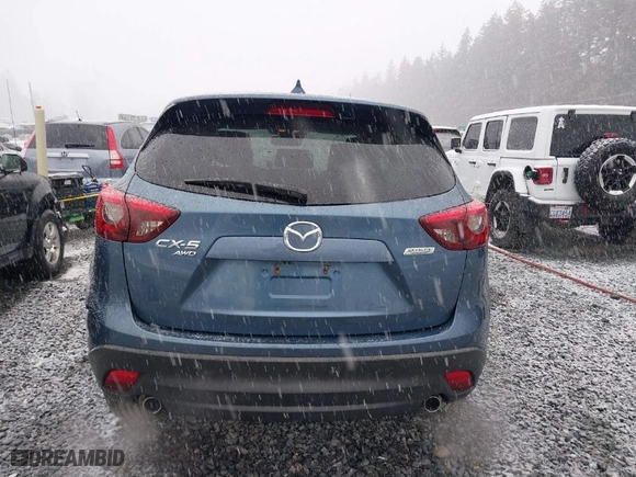 2016 Mazda CX-5 Grand Touring with VIN JM3KE4DY4G0687230, listed as a IAAI auction lot 41510915 with NaN miles. Bid and sale history available at carsss.com. Image 17.