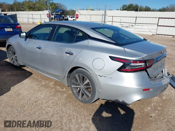 2019 Nissan Maxima SV with VIN 1N4AA6AV0KC371696, listed as a IAAI auction lot 41240863 with 143,348 mi miles and . Bid and sale history available at DreamBid. Image 3.