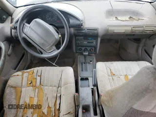1993 Chevrolet Corsica LT z VIN 1G1LT53T4PY262289, wystawiony jako Copart lot #81687643 z przebiegiem 236 597 mil mil oraz Tytuł czysty. Historia ofert i sprzedaży dostępna na DreamBid. Obrazek 8.