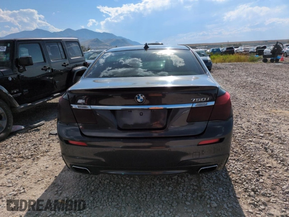 2011 BMW 7 Series 750i with VIN WBAKA8C59BCY36660, listed as a Copart auction lot 64260145 with 121,047 mi miles and Clean title. Bid and sale history available at DreamBid. Image 6.