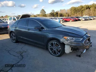 2019 Ford Fusion Titanium with VIN 3FA6P0K98KR271219, listed as a Copart auction lot 47873695 with 121,751 mi miles and Clean Title. Bid and sale history available at carsss.com. Image 4.