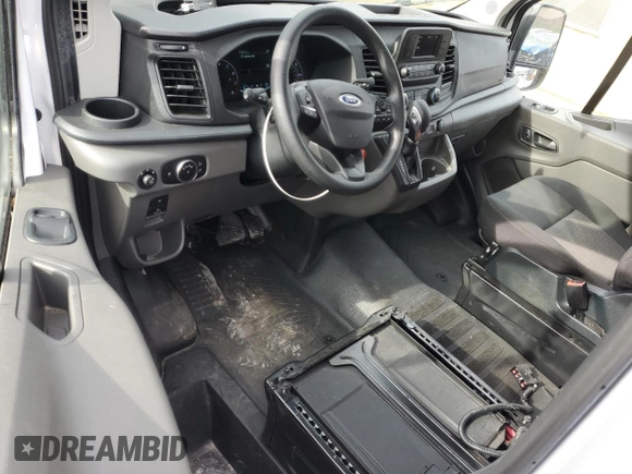 2023 Ford Transit Cargo with VIN 1FTBR1Y85PKA77962, listed as a Copart auction lot 83095814 with 21,928 mi miles and Clean Title. Bid and sale history available at DreamBid. Image 8.