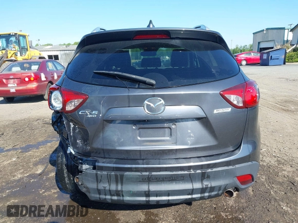2014 Mazda CX-5 Grand Touring with VIN JM3KE4DY2E0312952, listed as a IAAI auction lot 42138721 with 99,993 mi miles and . Bid and sale history available at DreamBid. Image 16.