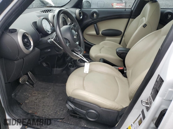 2012 MINI Countryman S with VIN WMWZC5C5XCWL55579, listed as a Copart auction lot 47970695 with 136,015 mi miles and Salvage Title. Bid and sale history available at DreamBid. Image 7.