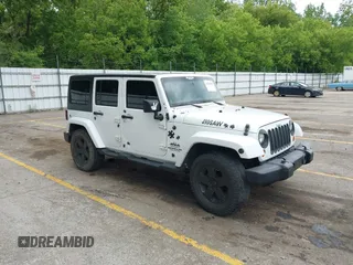 2012 Jeep Wrangler Unlimited Sahara with VIN 1C4BJWEG5CL180898, listed as a IAAI auction lot 42378609 with 157,855 mi miles and . Bid and sale history available at DreamBid. Image 1.