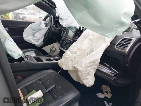 2021 Jeep Grand Cherokee Laredo X with VIN 1C4RJFAG2MC589415, listed as a IAAI auction lot 42514387 with 66,033 mi miles and . Bid and sale history available at DreamBid. Image 5.