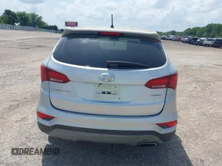 2018 Hyundai Santa Fe 2.4L with VIN 5XYZT3LB4JG557373, listed as a IAAI auction lot 42511741 with 142,572 mi miles and . Bid and sale history available at DreamBid. Image 17.