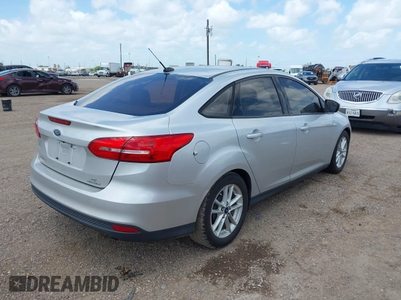 2015 Ford Focus SE with VIN 1FADP3F28FL205635, listed as a IAAI auction lot 42535860 with 135,994 mi miles and . Bid and sale history available at DreamBid. Image 4.
