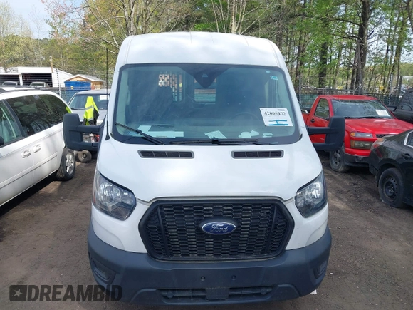 2021 Ford Transit Cargo with VIN 1FTBR1C85MKA48173, listed as a IAAI auction lot 42005472 with 81,980 mi miles and . Bid and sale history available at DreamBid. Image 12.