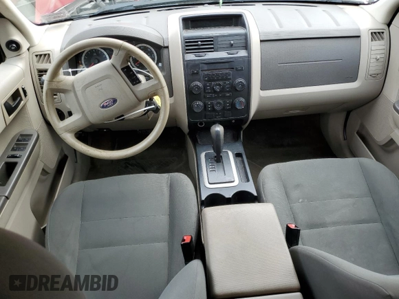 2011 Ford Escape XLS with VIN 1FMCU9C75BKC31381, listed as a Copart auction lot 52886575 with 128,640 mi miles and Salvage title. Bid and sale history available at DreamBid. Image 8.