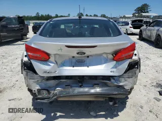 2017 Ford Focus SE with VIN 1FADP3F27HL223918, listed as a Copart auction lot 57464685 with 134,253 mi miles and Salvage title. Bid and sale history available at DreamBid. Image 6.