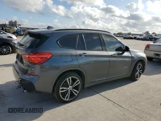 2018 BMW X1 sDrive28i with VIN WBXHU7C3XJ5H38906, listed as a Copart auction lot 36572583 with 71,860 mi miles. Bid and sale history available at carsss.com. Image 3.