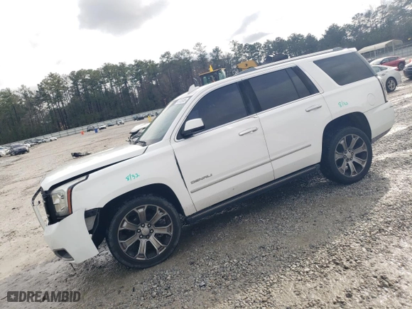 2015 GMC Yukon Denali with VIN 1GKS1CKJ4FR506727, listed as a Copart auction lot 47725185 with 120,277 mi miles and Salvage Title. Bid and sale history available at carsss.com. Image 1.