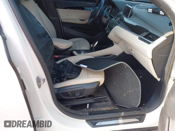 2021 BMW X1 xDrive28i with VIN WBXJG9C02M3M42379, listed as a IAAI auction lot 42476221 with 60,412 mi miles and . Bid and sale history available at DreamBid. Image 5.