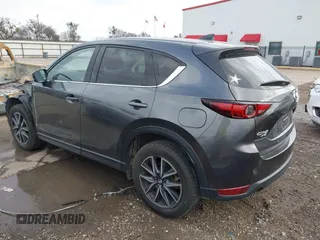 2018 Mazda CX-5 Grand Touring with VIN JM3KFBDM8J0441867, listed as a IAAI auction lot 41565147 with 62,466 mi miles. Bid and sale history available at carsss.com. Image 3.