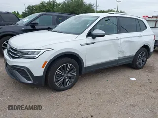 2024 Volkswagen Tiguan Wolfsburg Edition with VIN 3VV5B7AXXRM233917, listed as a IAAI auction lot 42780573 with 11,983 mi miles and . Bid and sale history available at DreamBid. Image 2.