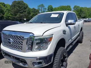 2017 Nissan Titan SL z VIN 1N6AA1E51HN503222, wystawiony jako IAAI lot #41908062 z przebiegiem 121 334 mil mil oraz . Historia ofert i sprzedaży dostępna na DreamBid. Obrazek 2.