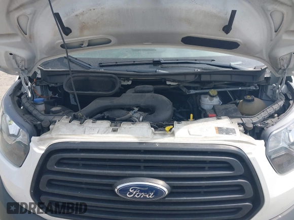 2019 Ford Transit with VIN 1FTBW2CM9KKB43845, listed as a IAAI auction lot 42122503 with 124,037 mi miles and . Bid and sale history available at DreamBid. Image 10.