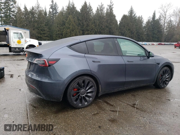 2022 Tesla Model Y Performance with VIN 7SAYGDEF2NF459268, listed as a Copart auction lot 45764735 with 64,421 mi miles and Salvage title. Bid and sale history available at DreamBid. Image 3.