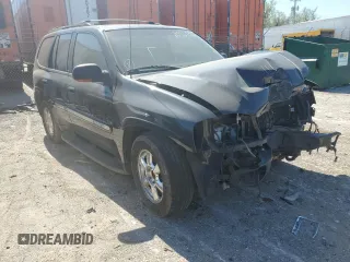 2003 GMC Envoy SLE with VIN 1GKDS13S732203933, listed as a Copart auction lot 72735604 with 0 mi miles and Clean Title. Bid and sale history available at carsss.com. Image 4.