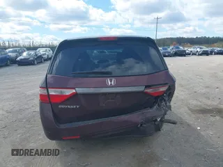 2013 Honda Odyssey LX with VIN 5FNRL5H28DB058401, listed as a IAAI auction lot 42050892 with 221,016 mi miles and . Bid and sale history available at carsss.com. Image 16.