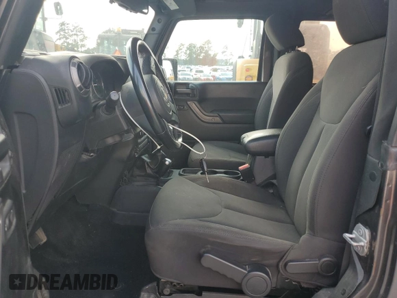 2017 Jeep Wrangler Sport with VIN 1C4AJWAG9HL721332, listed as a Copart auction lot 63459185 with 143,608 mi miles and Salvage title. Bid and sale history available at DreamBid. Image 7.