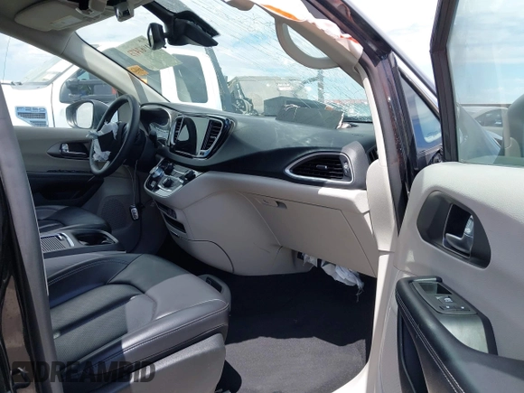 2023 Chrysler Pacifica Touring L with VIN 2C4RC1BG7PR510912, listed as a IAAI auction lot 41967473 with 67,907 mi miles and . Bid and sale history available at DreamBid. Image 5.