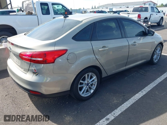 2015 Ford Focus SE z VIN 1FADP3F29FL206003, wystawiony jako IAAI lot #42187898 z przebiegiem 149 560 mil mil oraz . Historia ofert i sprzedaży dostępna na DreamBid. Obrazek 4.
