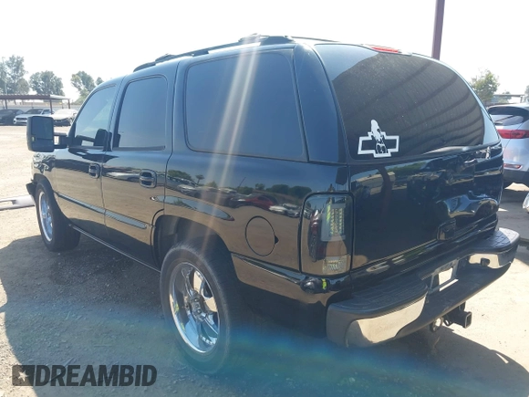 2003 Chevrolet Tahoe LS z VIN 1GNEC13T53J331221, wystawiony jako IAAI lot #42422243 z przebiegiem Nie podano mil oraz . Historia ofert i sprzedaży dostępna na DreamBid. Obrazek 3.