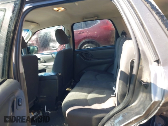 2006 Mazda Tribute i with VIN 4F2YZ92Z16KM25216, listed as a IAAI auction lot 41664006 with 228,222 mi miles and . Bid and sale history available at carsss.com. Image 8.