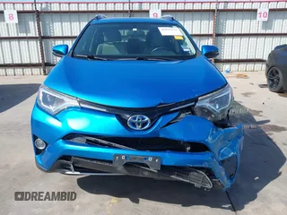 2016 Toyota RAV4 Hybrid XLE with VIN JTMRJREV5GD014170, listed as a IAAI auction lot 41822178 with 89,676 mi miles. Bid and sale history available at carsss.com. Image 17.
