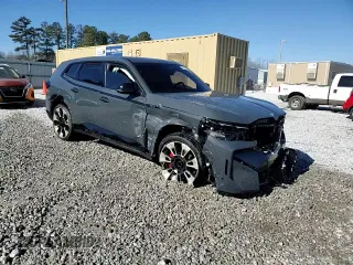 2023 BMW XM z VIN 5YM23CS03P9S57455, wystawiony jako Copart lot #87658815 z przebiegiem Nie podano mil oraz Szkoda całkowita • Salvage title. Historia ofert i sprzedaży dostępna na DreamBid. Obrazek 14.