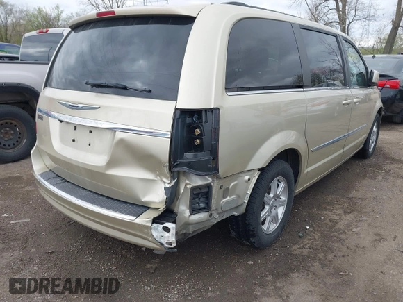 2011 Chrysler Town & Country Touring with VIN 2A4RR5DGXBR666934, listed as a IAAI auction lot 42022807 with 125,920 mi miles and . Bid and sale history available at DreamBid. Image 6.