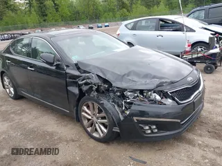 2015 Kia Optima SX Turbo with VIN 5XXGR4A69FG365072, listed as a IAAI auction lot 42295872 with 121,269 mi miles and . Bid and sale history available at DreamBid. Image 1.