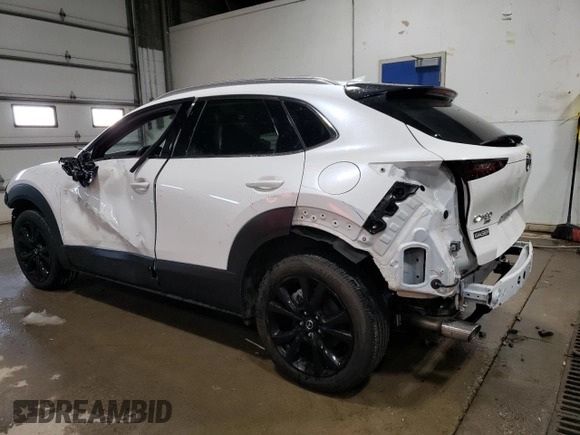 2023 Mazda CX-30 Premium Plus with VIN 3MVDMBEY3PM587798, listed as a Copart auction lot 86524444 with 9,860 mi miles and Salvage title. Bid and sale history available at DreamBid. Image 2.