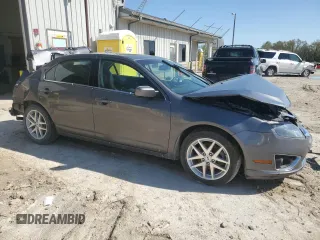 2012 Ford Fusion SEL with VIN 3FAHP0JA9CR392959, listed as a Copart auction lot 53688795 with 181,575 mi miles and Salvage Title. Bid and sale history available at DreamBid. Image 4.