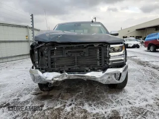 2018 Chevrolet Silverado 1500 LTZ with VIN 3GCUKSEC2JG252632, listed as a Copart auction lot 83596274 with 131,314 mi miles and Salvage Title. Bid and sale history available at carsss.com. Image 5.