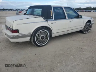 1987 Cadillac Seville z VIN 1G6KS518XHU812739, wystawiony jako Copart lot #79308574 z przebiegiem Nie podano mil oraz Szkoda całkowita • Salvage title. Historia ofert i sprzedaży dostępna na DreamBid. Obrazek 3.