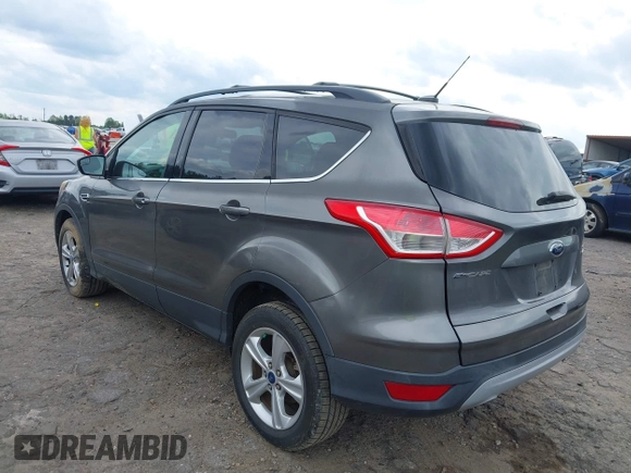 2013 Ford Escape SE with VIN 1FMCU9GX4DUC98328, listed as a IAAI auction lot 41956249 with 114,195 mi miles and . Bid and sale history available at DreamBid. Image 3.
