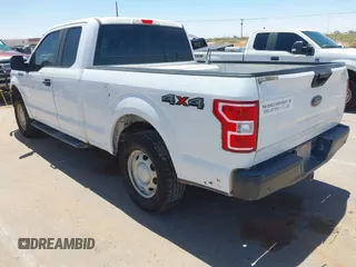 2018 Ford F-150 XL with VIN 1FTFX1E5XJKD86996, listed as a IAAI auction lot 42256819 with 141,798 mi miles and . Bid and sale history available at DreamBid. Image 3.
