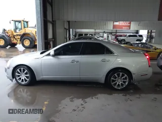 2009 Cadillac CTS RWD w/1SB with VIN 1G6DV57V090157738, listed as a IAAI auction lot 41180254 with 129,361 mi miles. Bid and sale history available at carsss.com. Image 14.