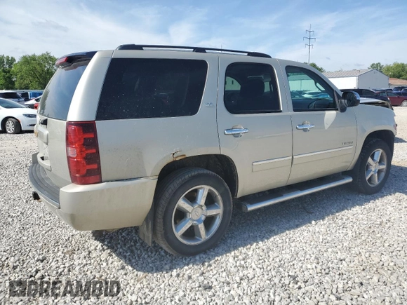 2014 Chevrolet Tahoe LTZ with VIN 1GNSKCE03ER201981, listed as a Copart auction lot 56421125 with 173,710 mi miles and Salvage title. Bid and sale history available at DreamBid. Image 3.