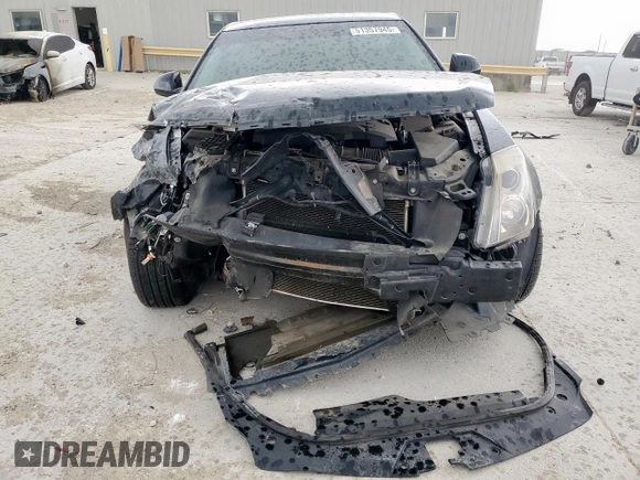2012 Cadillac CTS z VIN 1G6DA5E54C0100982, wystawiony jako Copart lot #51357945 z przebiegiem 100 798 mil mil oraz Szkoda całkowita • Salvage title. Historia ofert i sprzedaży dostępna na DreamBid. Obrazek 5.