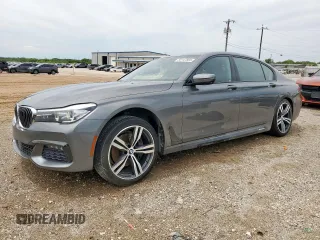 2016 BMW 7 Series 740i with VIN WBA7E2C51GG547019, listed as a Copart auction lot 59147855 with 123,487 mi miles and Salvage title. Bid and sale history available at DreamBid. Image 1.