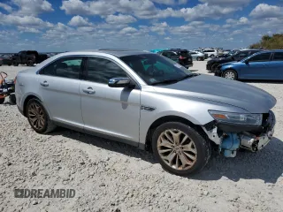 2013 Ford Taurus Limited z VIN 1FAHP2F80DG105499, wystawiony jako Copart lot #70792614 z przebiegiem 106 425 mil mil oraz Czysty tytuł • Clean title. Historia ofert i sprzedaży dostępna na DreamBid. Obrazek 4.