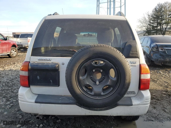 2000 Suzuki Grand Vitara JLX with VIN JS3TD62V4Y4121259, listed as a Copart auction lot 43538045 with 127,915 mi miles and Salvage Title. Bid and sale history available at carsss.com. Image 6.