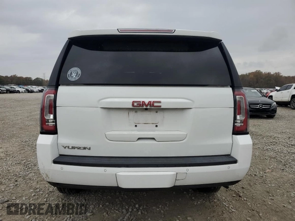 2020 GMC Yukon SLT with VIN 1GKS1BKC3LR168874, listed as a Copart auction lot 82103464 with 79,220 mi miles and Salvage Title. Bid and sale history available at DreamBid. Image 6.