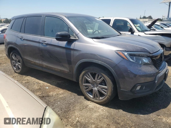 2021 Honda Passport EX-L with VIN 5FNYF7H5XMB013999, listed as a Copart auction lot 61893804 with 52,859 mi miles and Salvage Title. Bid and sale history available at carsss.com. Image 4.