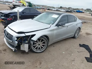 2014 Infiniti Q50 with VIN JN1BV7AP0EM681679, listed as a IAAI auction lot 41371773 with 141,940 mi miles. Bid and sale history available at carsss.com. Image 2.